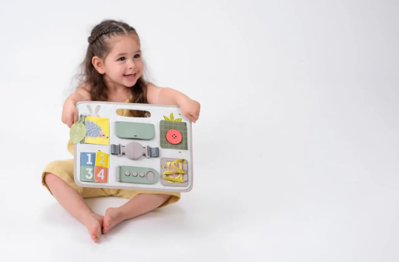 Taf toys – activity buckles board